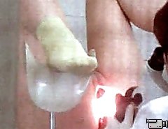 Catching a glimpse of pussy plugged with speculum