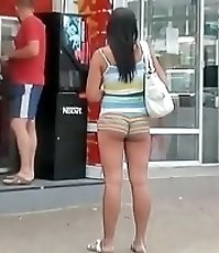 The chubby girl in really short shorts unwillingly demonstrates her bubble butt cheeks
