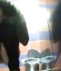 Cutie in pantyhose peeing in front of spycam