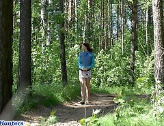 Cute lonely walker playing watersports in forest