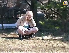 Spying on blonde peeing and smoking teen