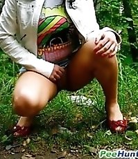 Bootylicious brunette takes a leak in public park