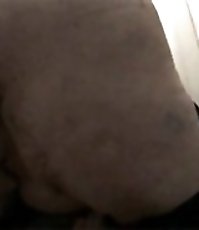 Huge wrinkled ass in front of spy cam in public WC