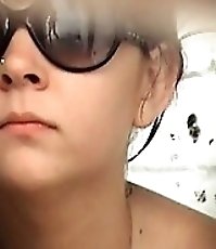 A glance at bikini girls' slits from spycammed WC