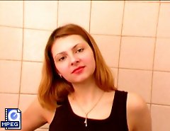 Cool blonde babe pees onto the bathroom walls