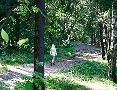 Voyeur shots of a blonde teeny pissing outdoors
