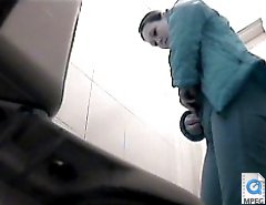 Pissing hotties squatted right over voyeur camera