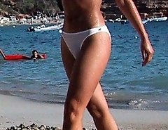 Babes put bikinis in order and get naked tits spied